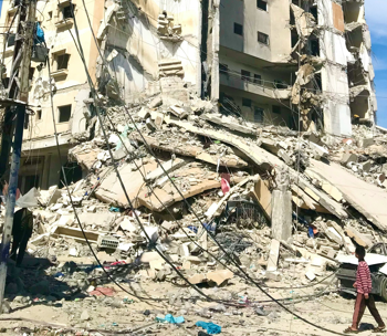 Ilustrasi Gedung yang runtuh akibat gempa (Unsplash)