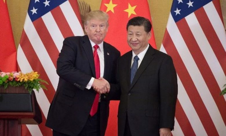 Tangkapan foto Xi Jinping dan Donald Trump. (Sumber: AFP/Nicolas Asfouri)