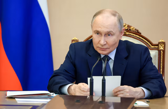 Tangkapan foto Presiden Putin. (Sumber: Sputnik/Vyacheslav Prokofyev/Pool via REUTERS)